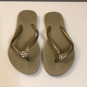 Havaianas Slim gold flip flops with jeweled flower